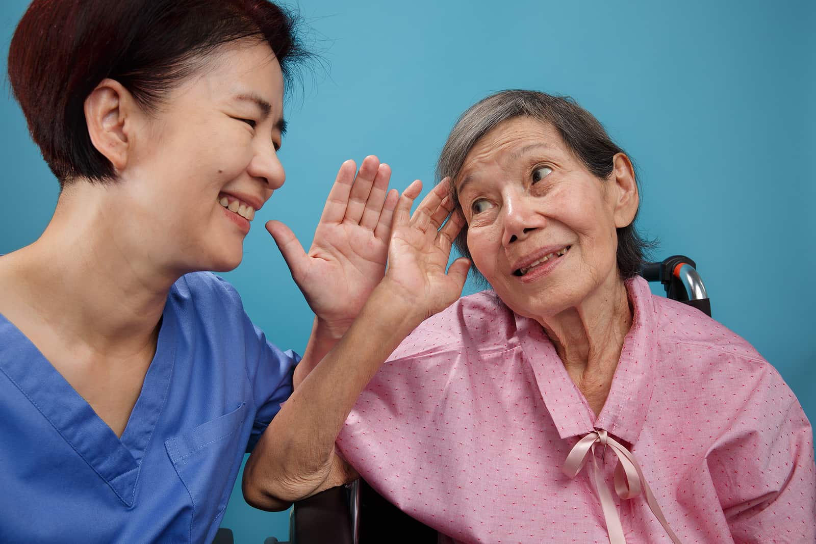 Asian seniors woman is hearing loss , Hard of hearing